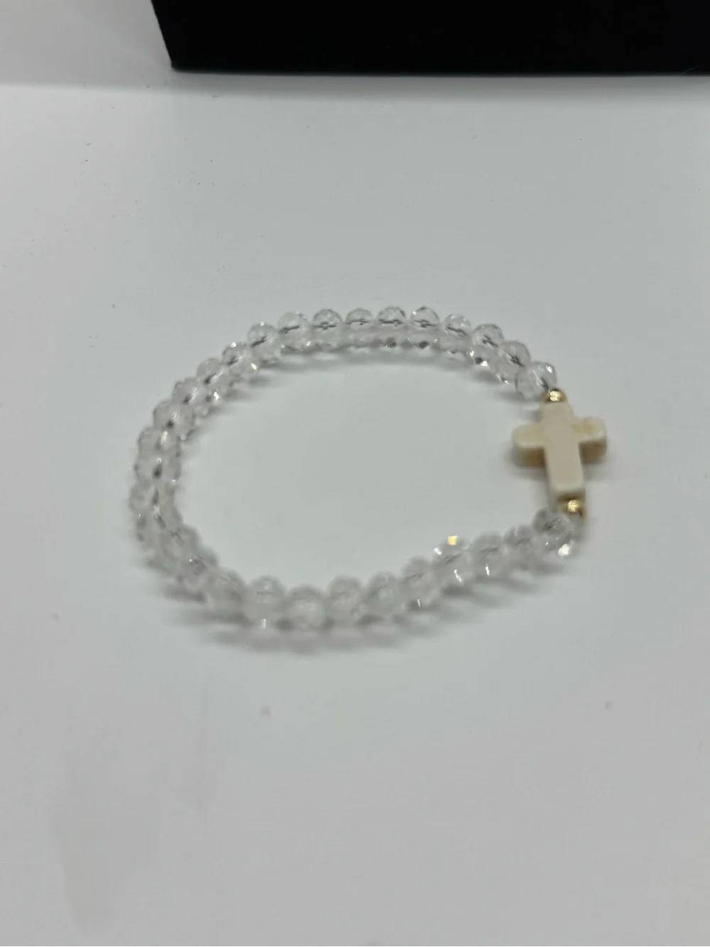 Clear Crystal Bead Stretch Bracelet with White Cross Accent